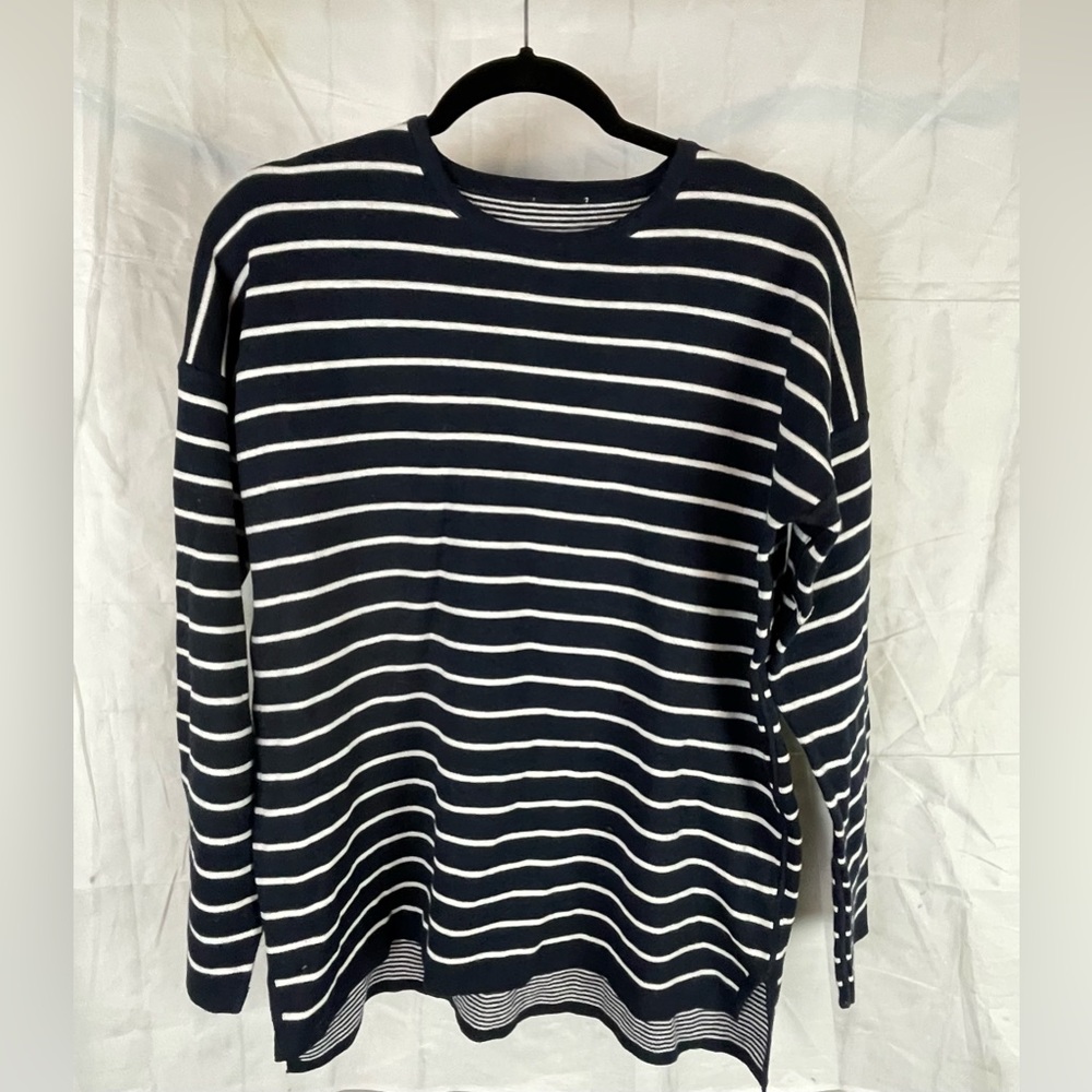 Blue and white striped woman’s top
